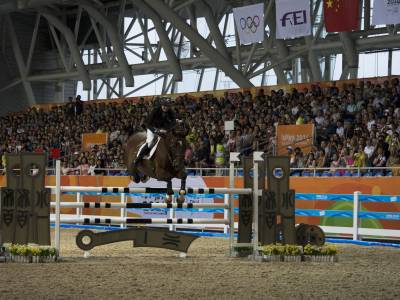 Gold in Show Jumping on Day Eight