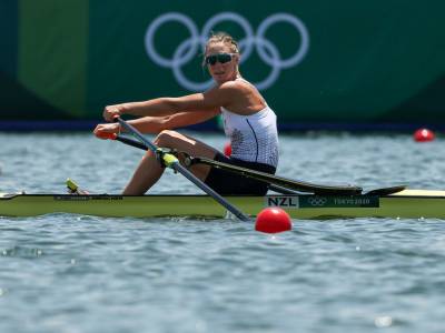 Twigg carries NZ flag at the rowing