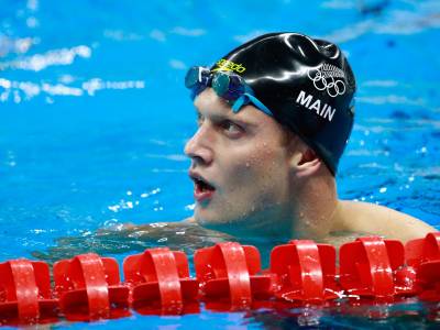 Two swimmers make semis