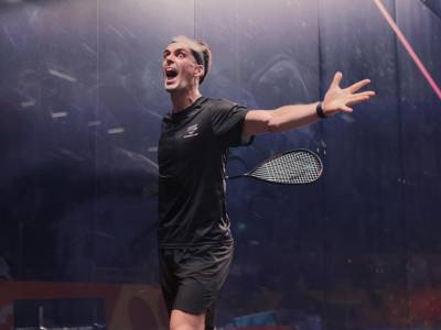 Coll digs deep to win squash gold